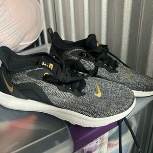 Nike Flex Black and Gold Athletic Shoes
